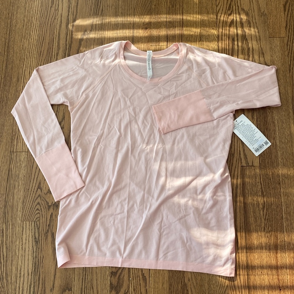 Brand new, with tag! Light pink size 18 Lululemon swiftly tech 2.0